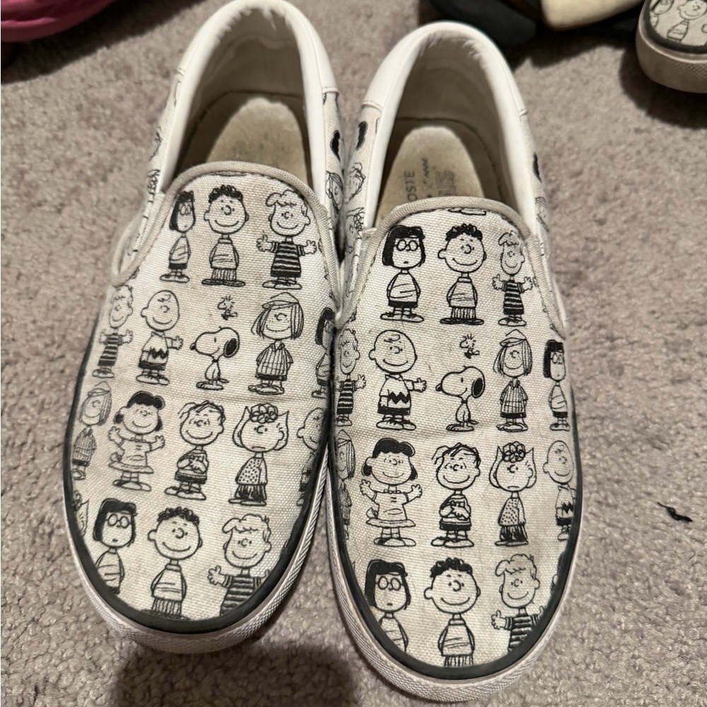 Lacoste Peanuts White Canvas Slip-On Sneakers with Black Character Print
